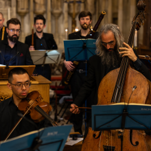 Musicians playing period musical instruments 