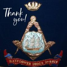 Crest showing ship, crown and words Mayflower Lodge No. 8815